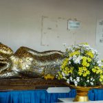Eine Buddhastatue am Wat Arun, Bangkok, Thailand